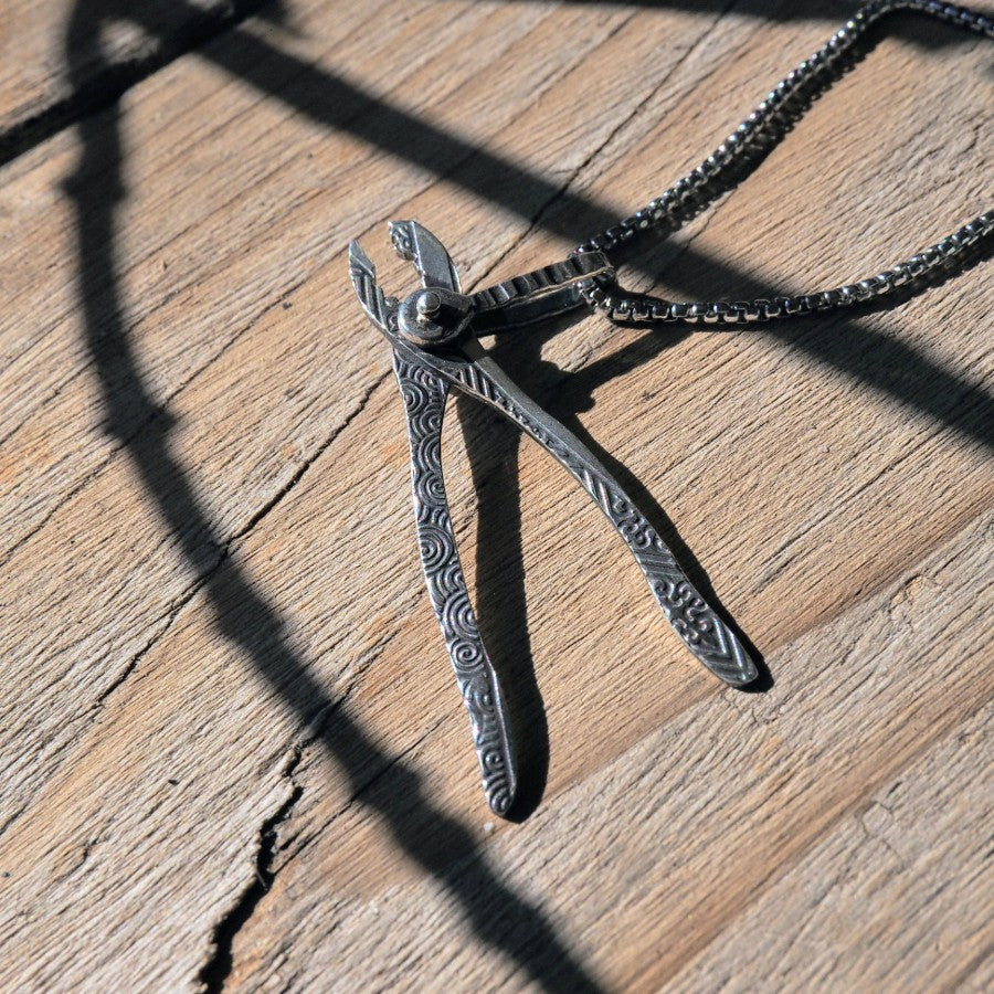 Ornate Plier Pendant in Silver